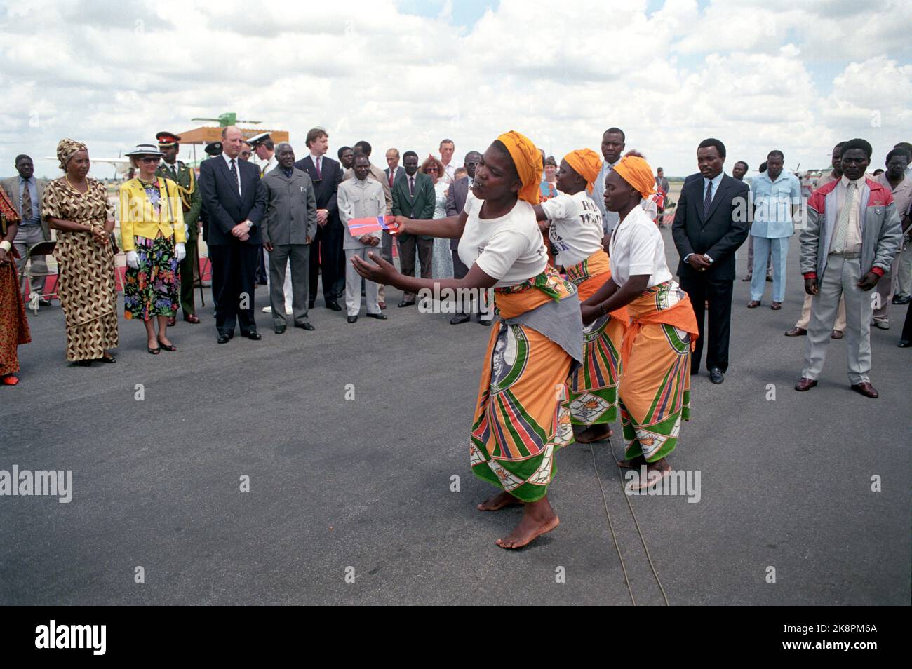 Zambia - March 1990 The Crown Prince couple in Zambia. Crown Prince Harald and Crown Princess Sonja were welcomed by colorful dancers at the airport when they arrived at Zambia's capital Lusaka on their official visit. Photo: Bjørn-Owe Holmberg / NTB Stock Photo