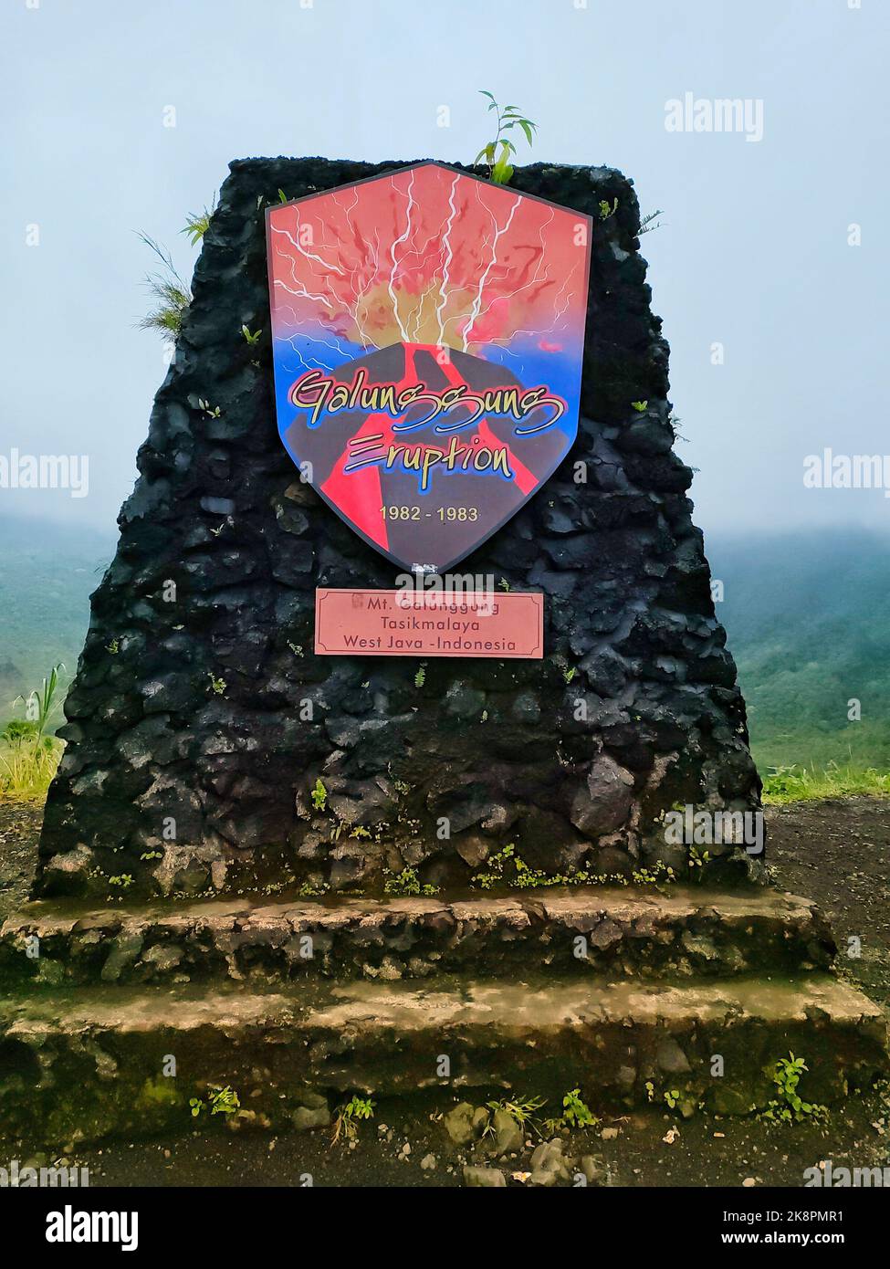 A vertical closeup of the Mount Galunggung eruption warning sign. Tasikmalaya, Indonesia. Stock Photo