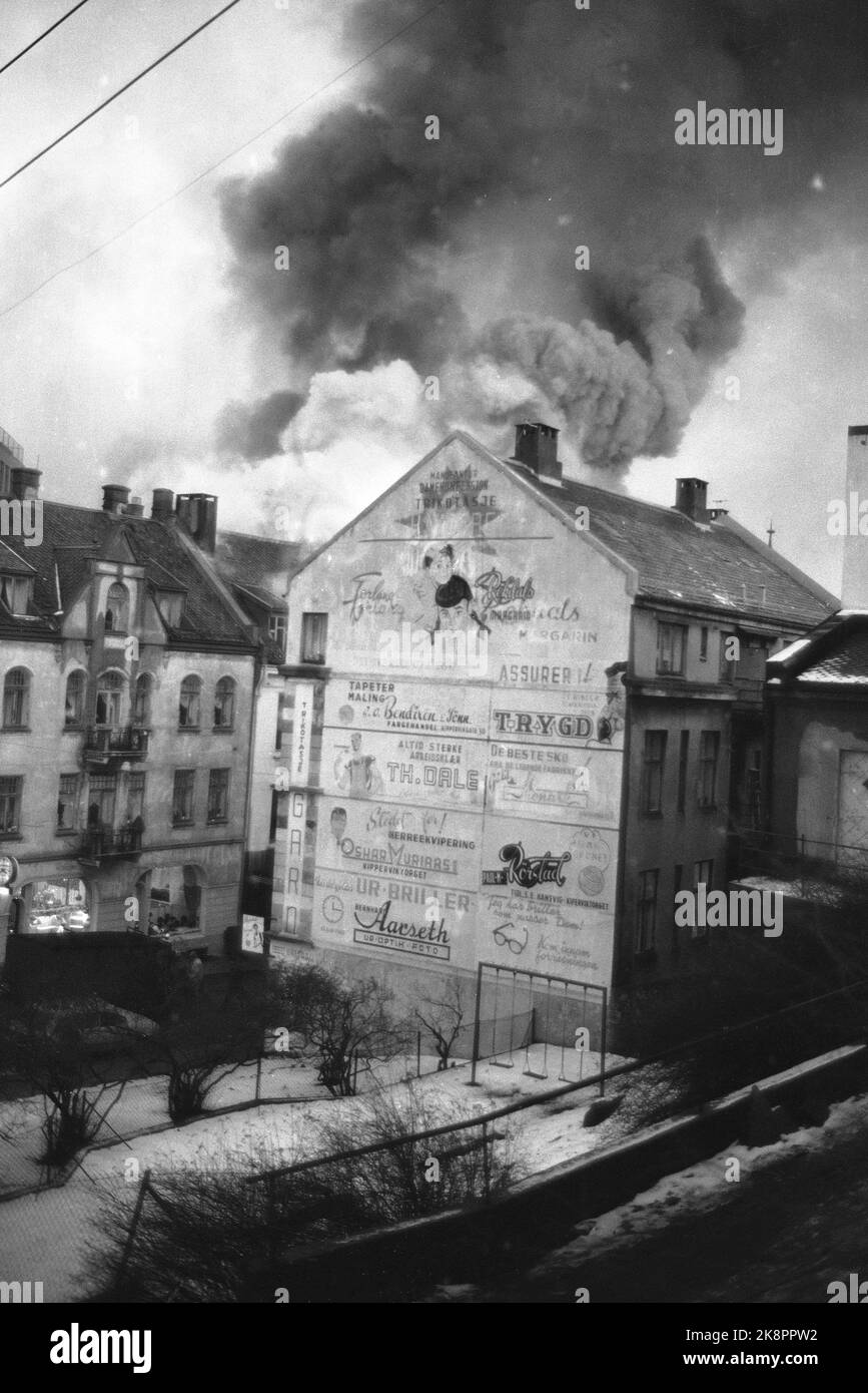 Ålesund 14 January 1967. Major fire in Ålesund. The city's largest business, J. E. Devold's followers burn. A hundred men fought for twenty hours against the Ålesund fire, but really it was the weather and the left over the wind that saved Ålesund from a new large urban disaster. Photo; Aage Storløkken / Current / NTB Stock Photo