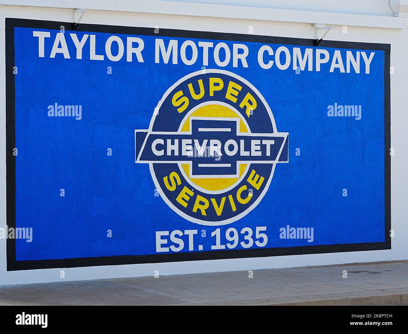 Taylor, Texas USA Colorful automobile car dealership painted sign