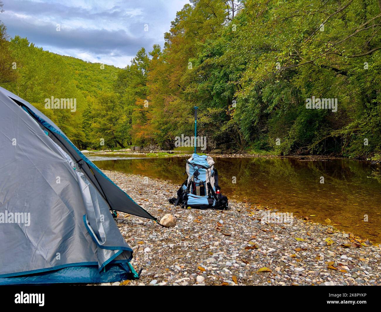 The camping tents at the lake shore in the green forest Stock Photo - Alamy