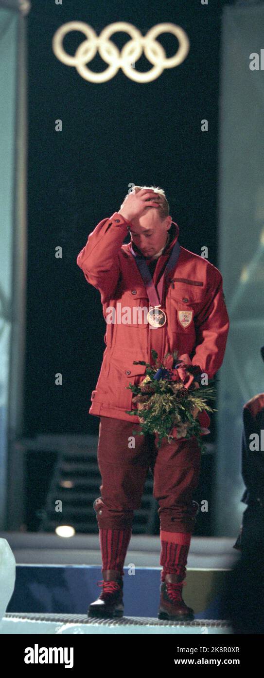 LIL 34 - Lillehammer. Olympics 1994. Alpine, Super-G, men. Victory ceremony. Bronze winner Kjetil Andre Aamodt (NOR) during the victory ceremony at Stampesletta on Thursday night. - - The picture is about 30 MB - - Photo: Erik Johansen Stock Photo