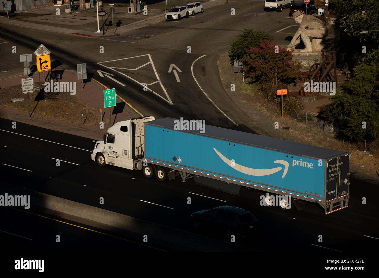 Auburn, California, USA - July 17, 2021: An Amazon Prime semi trailer truck moves freight on interstate 80 through Auburn. Stock Photo