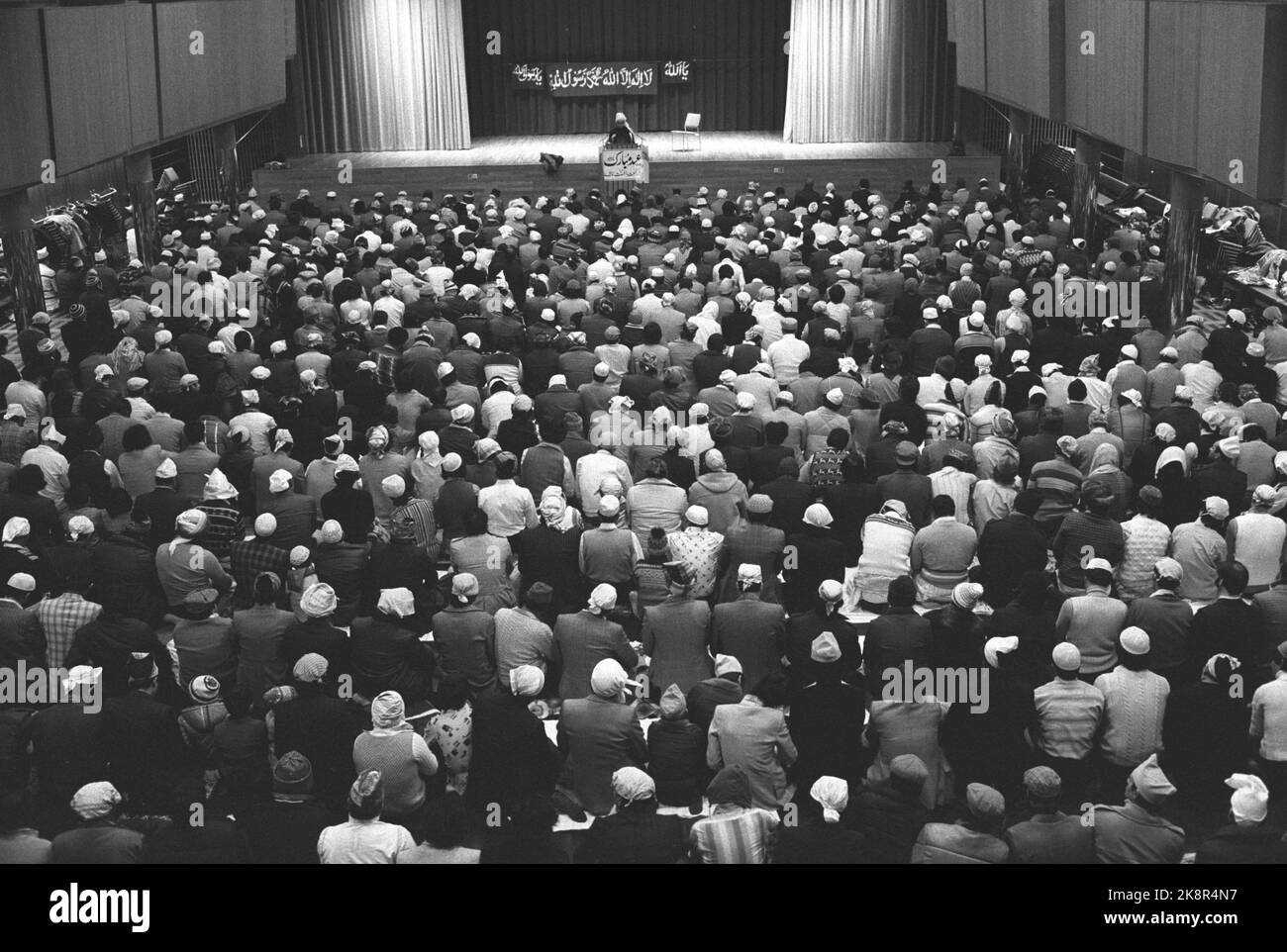 Oslo October 31, 1979. The Muslims in the Oslo area on Wednesday celebrated Sind Aie-e-Azha, their second largest annual celebration. The party is in memory of Abraham who sacrificed his son Ismail to God. The feast day begins with prayer and in Oslo the celebration took place in two places, in the Samfundsalen and Storsalen in the People's House, where this picture is from. Photo: Vidar Knai / NTB / NTB Stock Photo