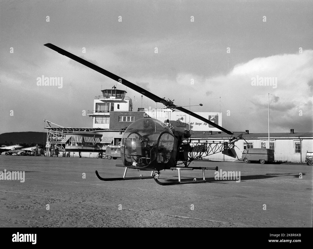 Oslo, Fornebu 19530409 Four of Norway's first six helicopters arrive Fornebu from Stockholm. The helicopters, which are of the Bell 47 type, will primarily be used for rescue service, and will be stationed at Gardermoen and Sola. Here one helicopter, with Fornebus Administration Building in the background. Photo: NTB / NTB Stock Photo