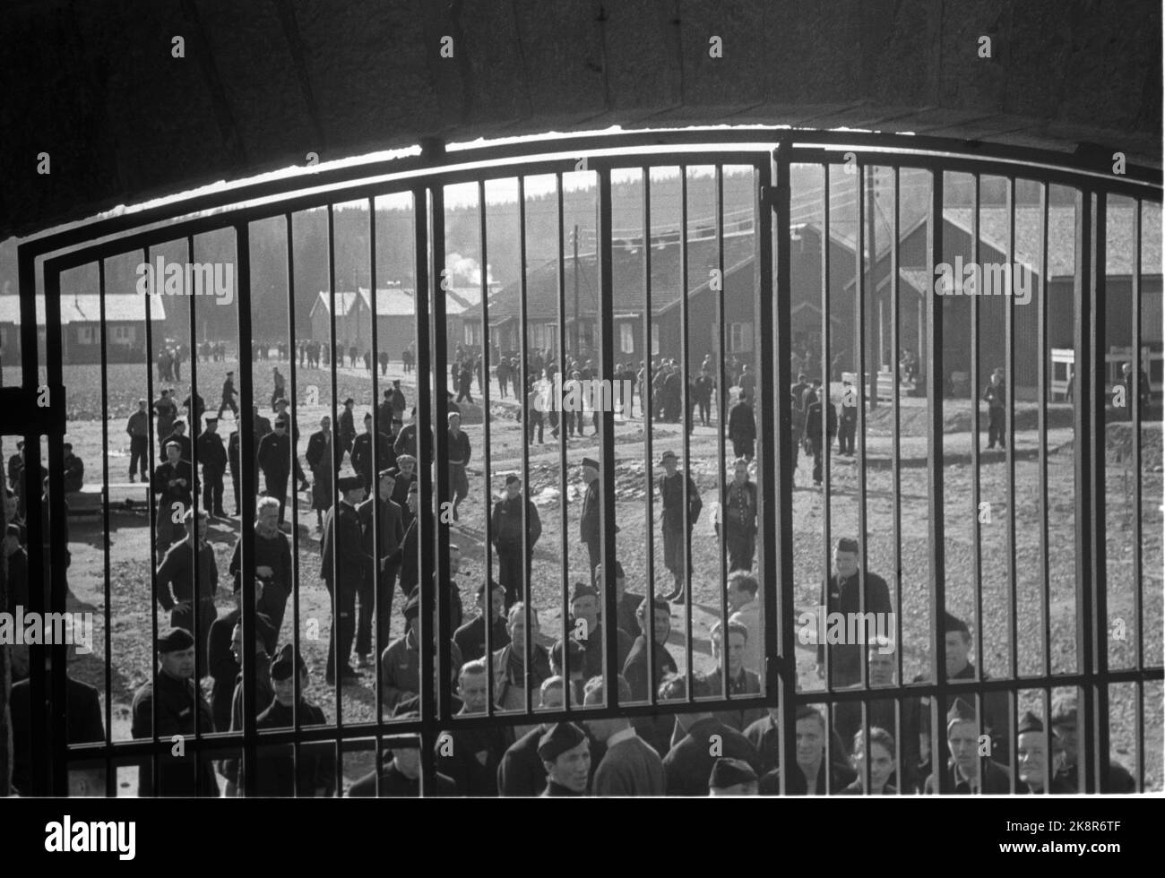 Grini 194508: The Peace Days May 1945. From Grini prison camp / concentration camp. Prisoners are seen through the grid gate. Photo: Haaland / NTB / NTB Stock Photo