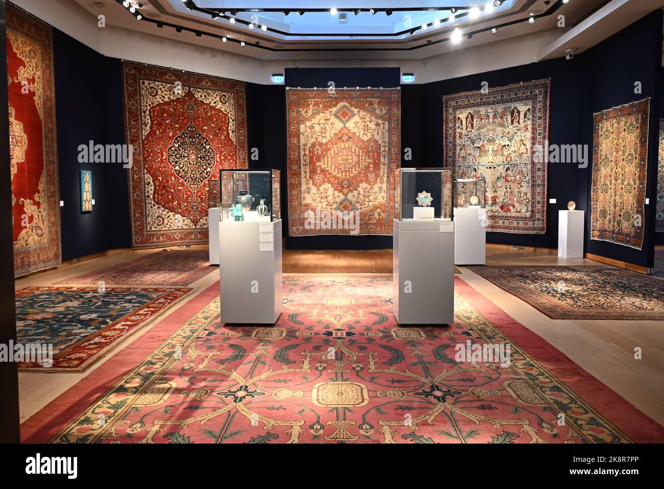 This October, Christie’s Arts of the Islamic and Indian worlds including Oriental rugs and carpets celebrates a wide range of artistic traditions and offers an array of collecting opportunities that includes rare and museum quality manuscripts, paintings, works of art and carpets.   The highlight of the sale is a 17th century Mughal pashmina ‘Flower and Lattice’ carpet, most certainly woven as a royal commission for the emperor Shah Jahan and never before seen at auction.  The sale will take place on the 27 th October 2022 at Christie's Kings Street , London . Stock Photo