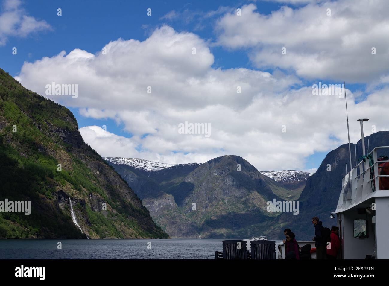 A boat captured in the Narrow Fjord in Aurland Municipality in Vestland county, Norway Stock Photo