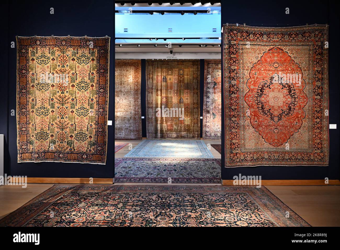 This October, Christie’s Arts of the Islamic and Indian worlds including Oriental rugs and carpets celebrates a wide range of artistic traditions and offers an array of collecting opportunities that includes rare and museum quality manuscripts, paintings, works of art and carpets.   The highlight of the sale is a 17th century Mughal pashmina ‘Flower and Lattice’ carpet, most certainly woven as a royal commission for the emperor Shah Jahan and never before seen at auction.  The sale will take place on the 27 th October 2022 at Christie's Kings Street , London . Stock Photo