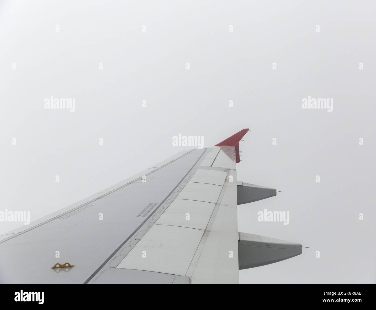 Airbus 320 wing during flight Stock Photo