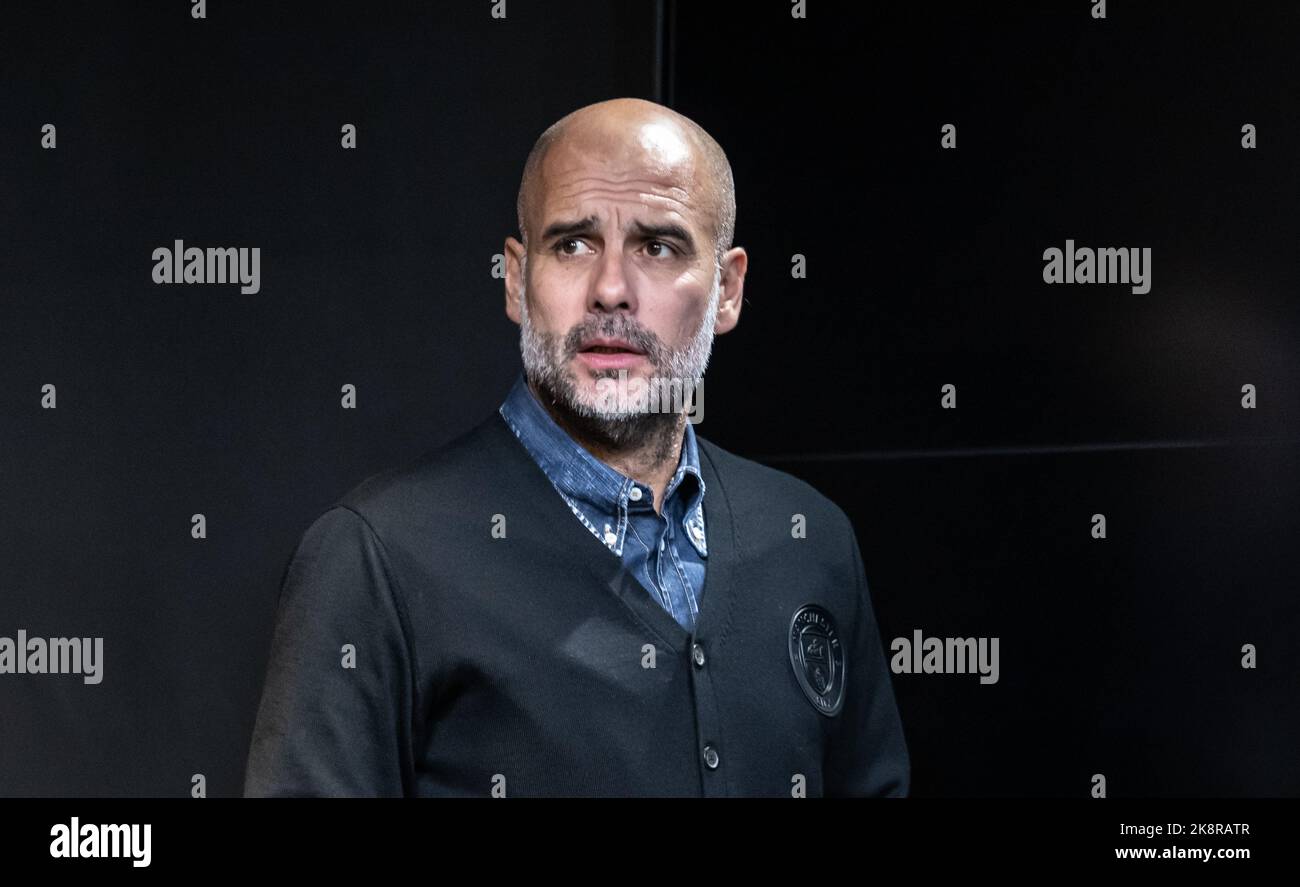 Dortmund, Germany. 24th Oct, 2022. Soccer: Champions League, Borussia Dortmund - Manchester City Group stage, Group G, Matchday 5, Press conference. Manchester coach Josep 'Pep' Guardiola arrives for the press conference before the match against Dortmund. Credit: Bernd Thissen/dpa/Alamy Live News Stock Photo