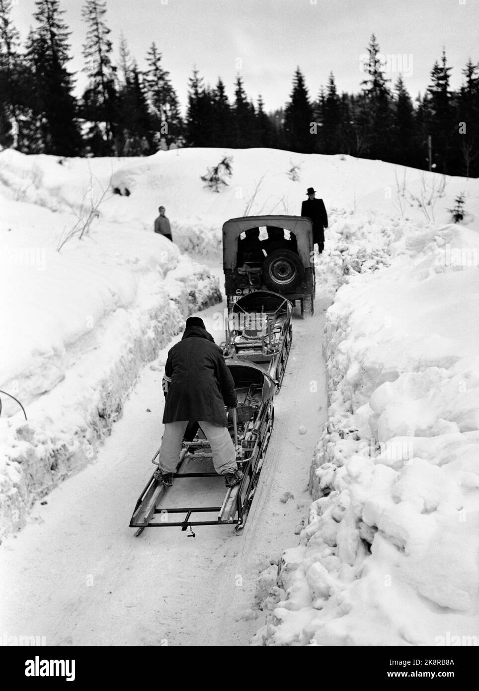 Oslo, Frognerseteren January 1951. The Bobsleigh course, which will be built for the Olympic Winter Games next winter, is ready for test driving. Here, some of the bobs are pulled up to the starting place again, using Jeep. Photo: Skotaam and Kjus / Current / NTB Stock Photo