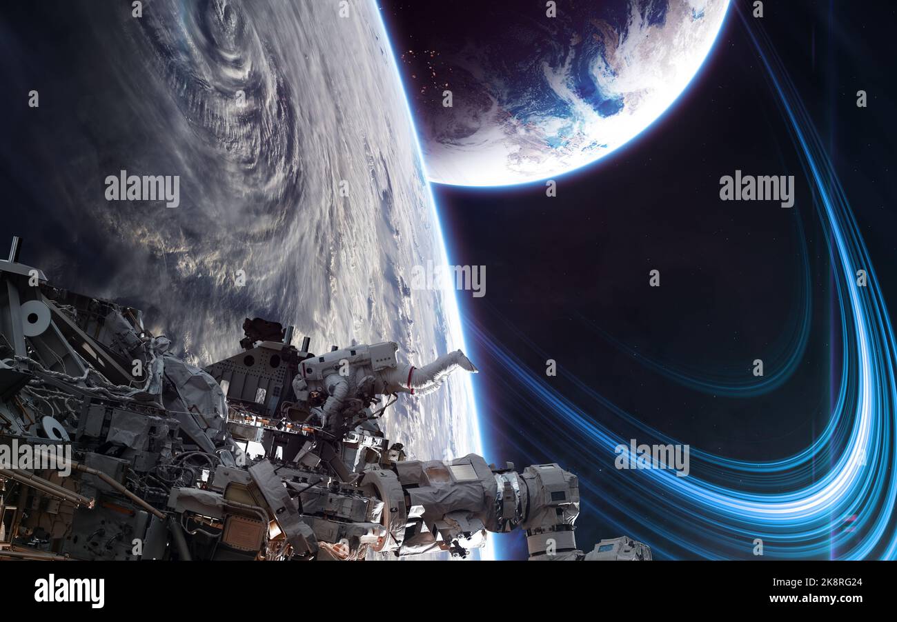 Orbital space station on background of deep space planets Stock Photo