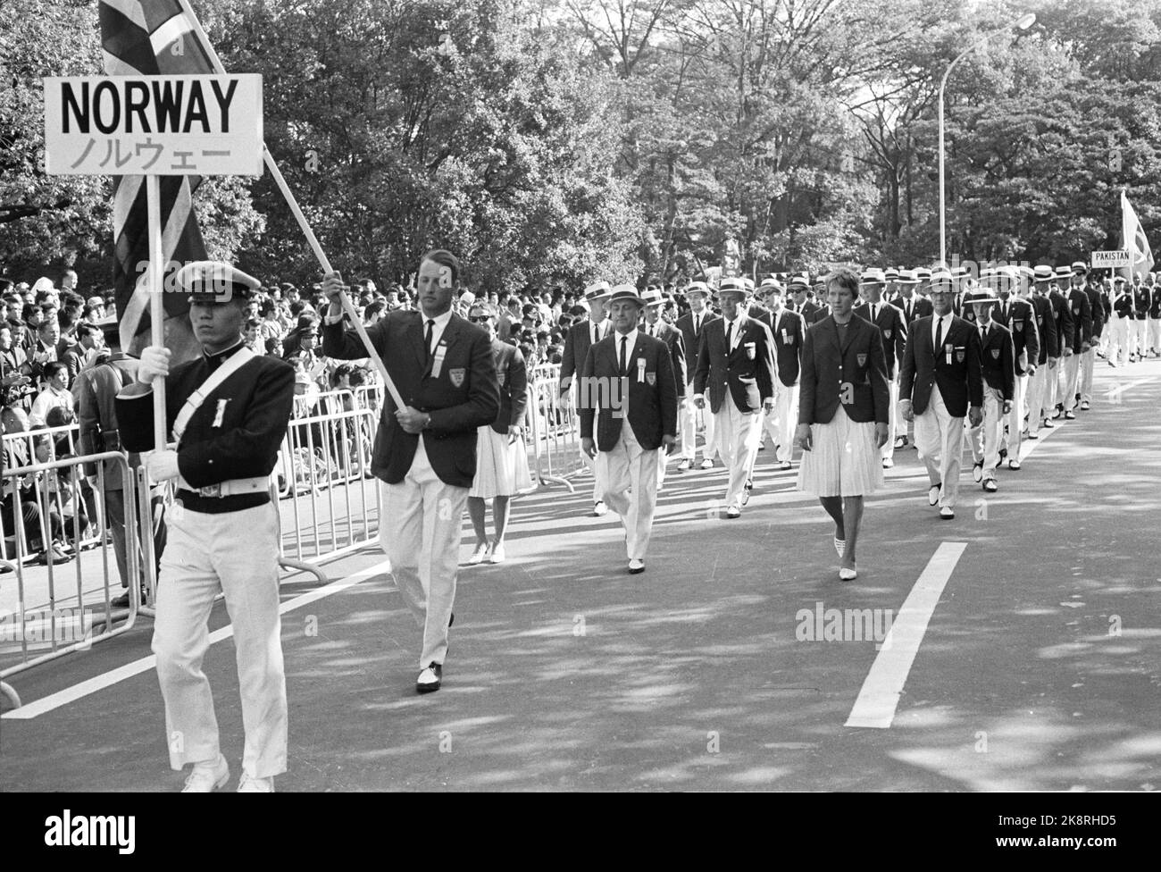 Tokyo, Japan 1964 Summer Olympics in Tokyo. The official opening ceremony. Crown Prince Harald participates in the Norwegian Olympic team in sailing, and is the flag bearer in the Norwegian squad. Ntb archive photo / ntb Stock Photo