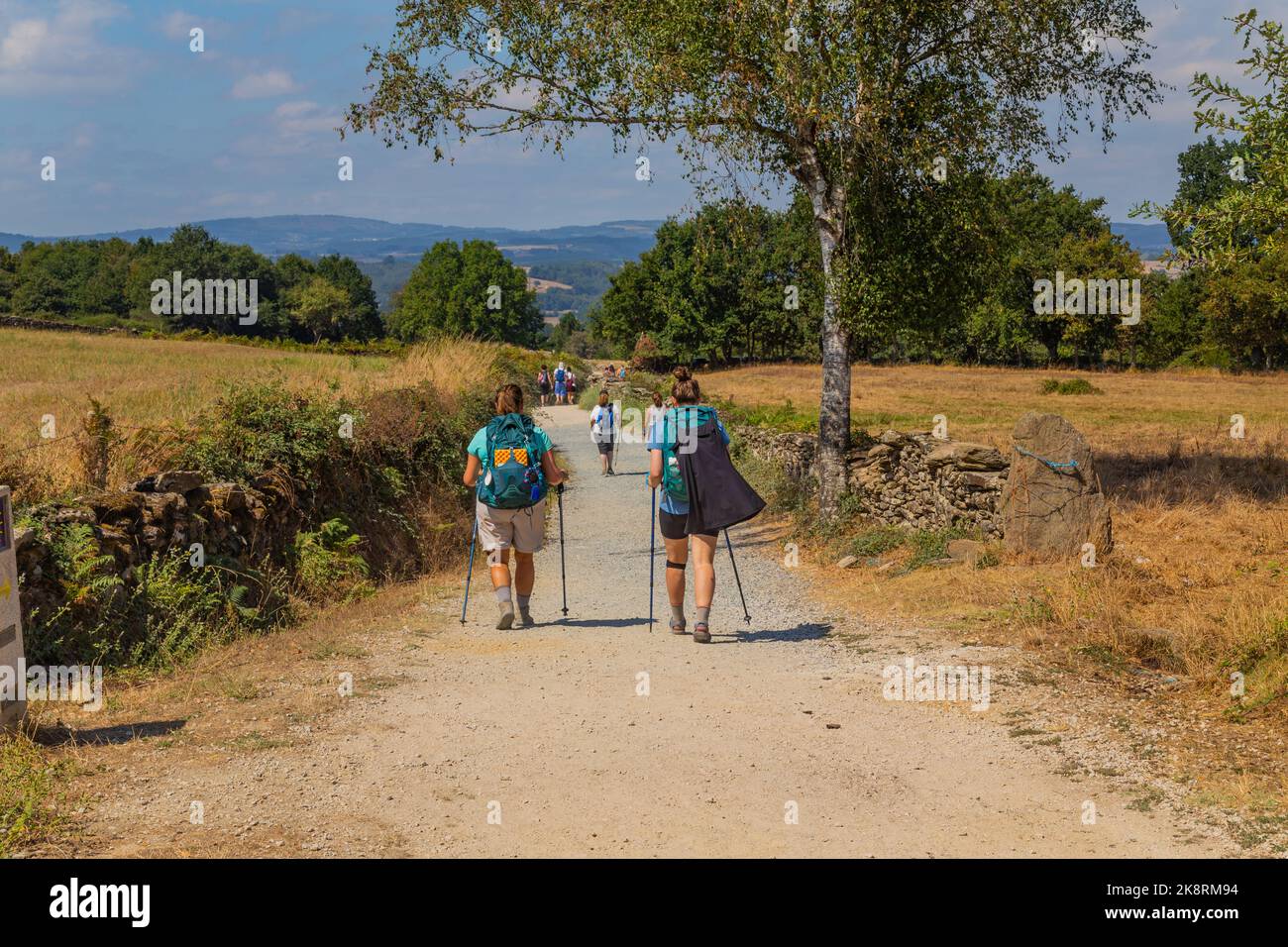 Navarre, Spain, 26 August, 2022: Pilgrims walk along the Camino De Santiago, the Way of St. James pilgrimage route, Navarra, Spain. Stock Photo