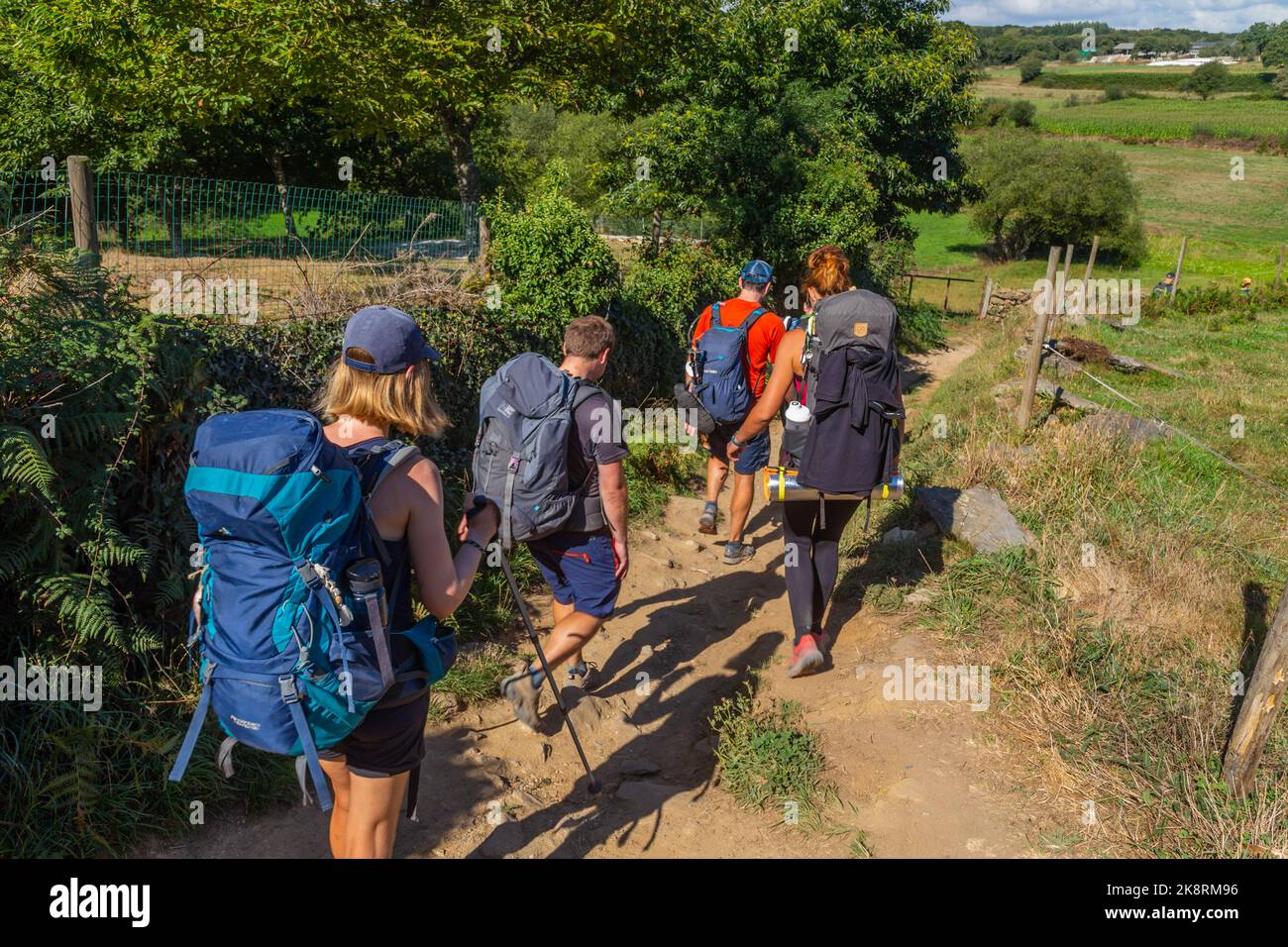 Navarre, Spain, 26 August, 2022: Pilgrims walk along the Camino De Santiago, the Way of St. James pilgrimage route, Navarra, Spain. Stock Photo