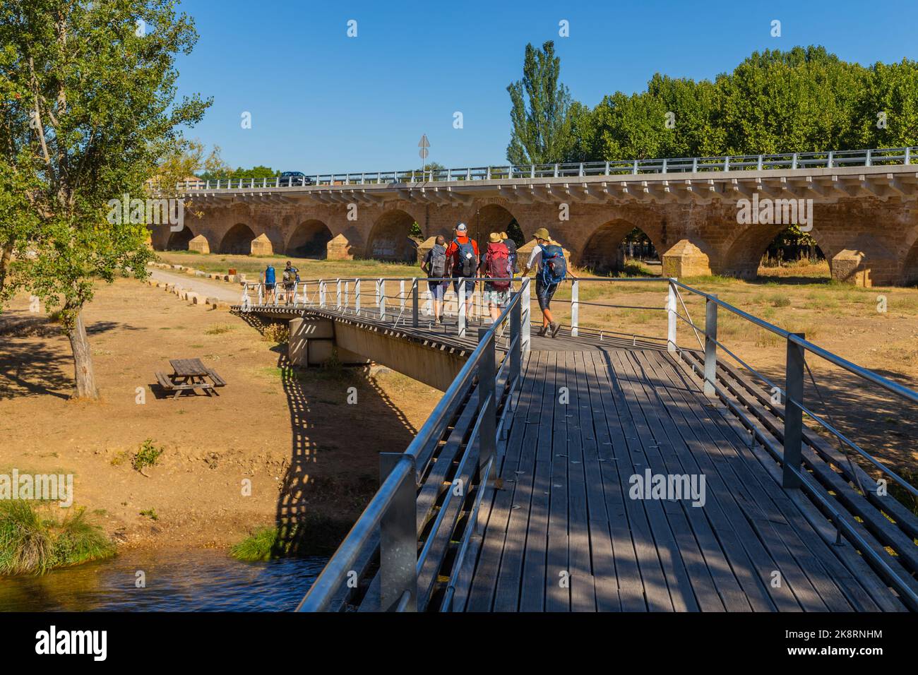 Navarre, Spain, 26 August, 2022: Pilgrims walk along the Camino De Santiago, the Way of St. James pilgrimage route, Navarra, Spain. Stock Photo