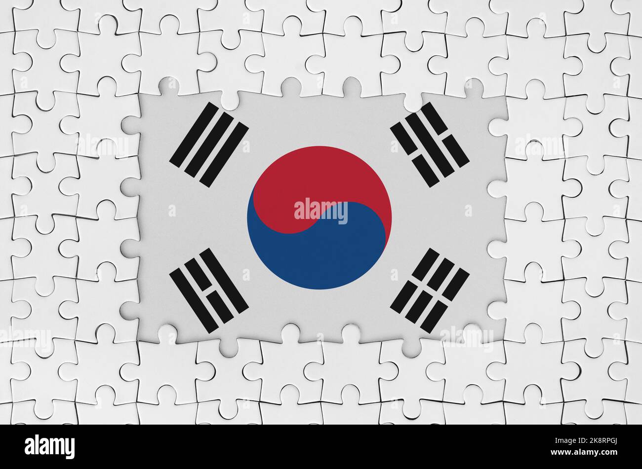 South Korea flag in frame of white puzzle pieces with missing central ...
