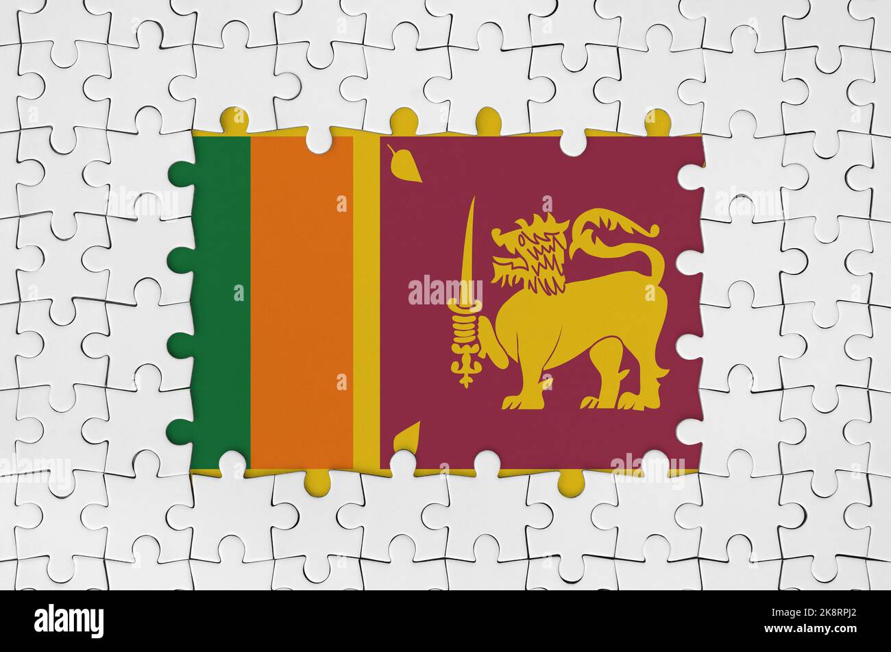 Sri Lanka flag in frame of white puzzle pieces with missing central