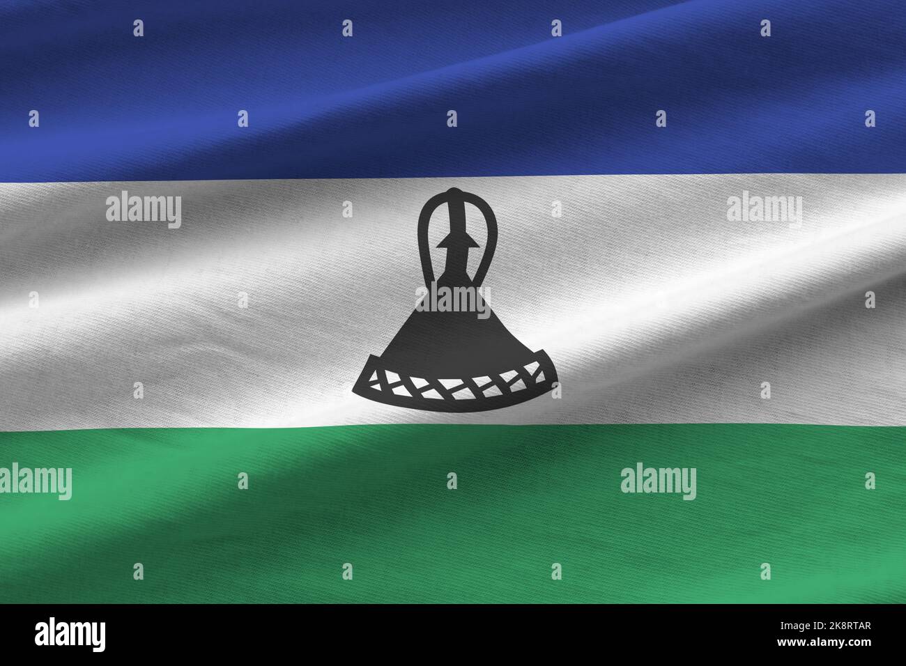 lesotho-flag-with-big-folds-waving-close-up-under-the-studio-light