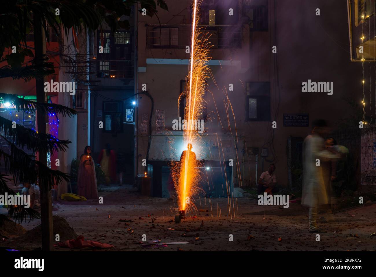 Ghaziabad, India. 24th Oct, 2022. People seen burning firecrackers ( Rocket) on the occasion of Diwali festival in Ghaziabad. Bursting of fireworks lead to a sharp rise of Air pollution immediately after the festival. (Photo by Pradeep Gaur/SOPA Images/Sipa USA) Credit: Sipa USA/Alamy Live News Stock Photo