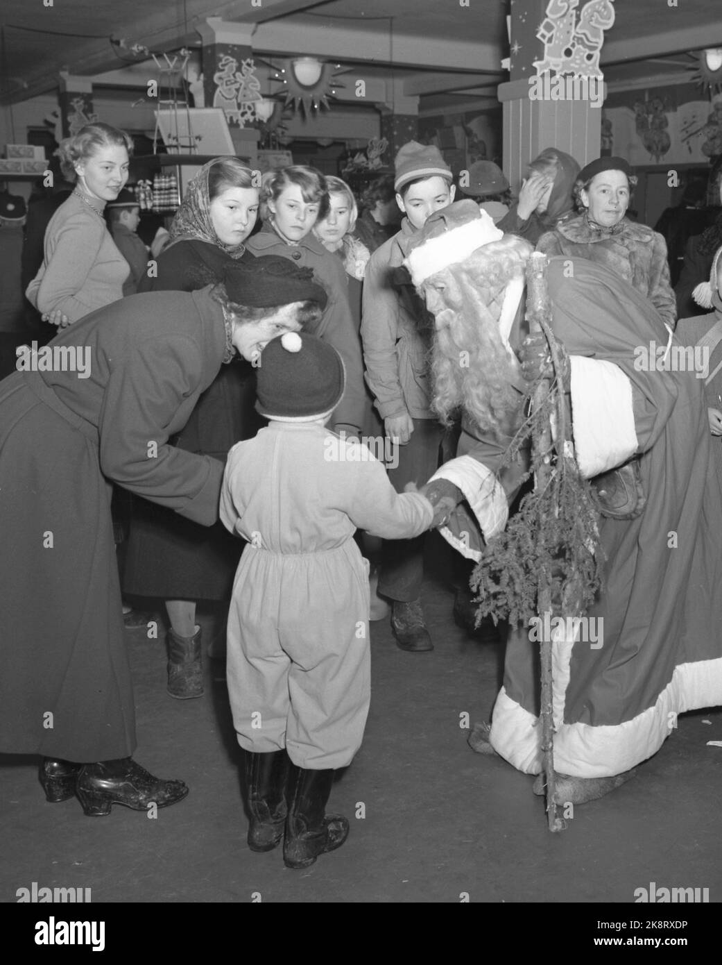 Women with father christmas Black and White Stock Photos & Images Alamy