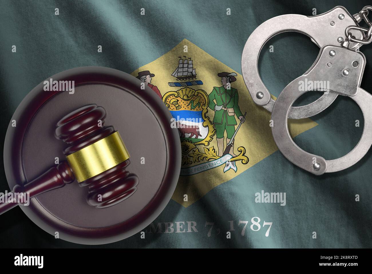 Delaware US state flag with judge mallet and handcuffs in dark room. Concept of criminal and punishment, background for guilty topics Stock Photo