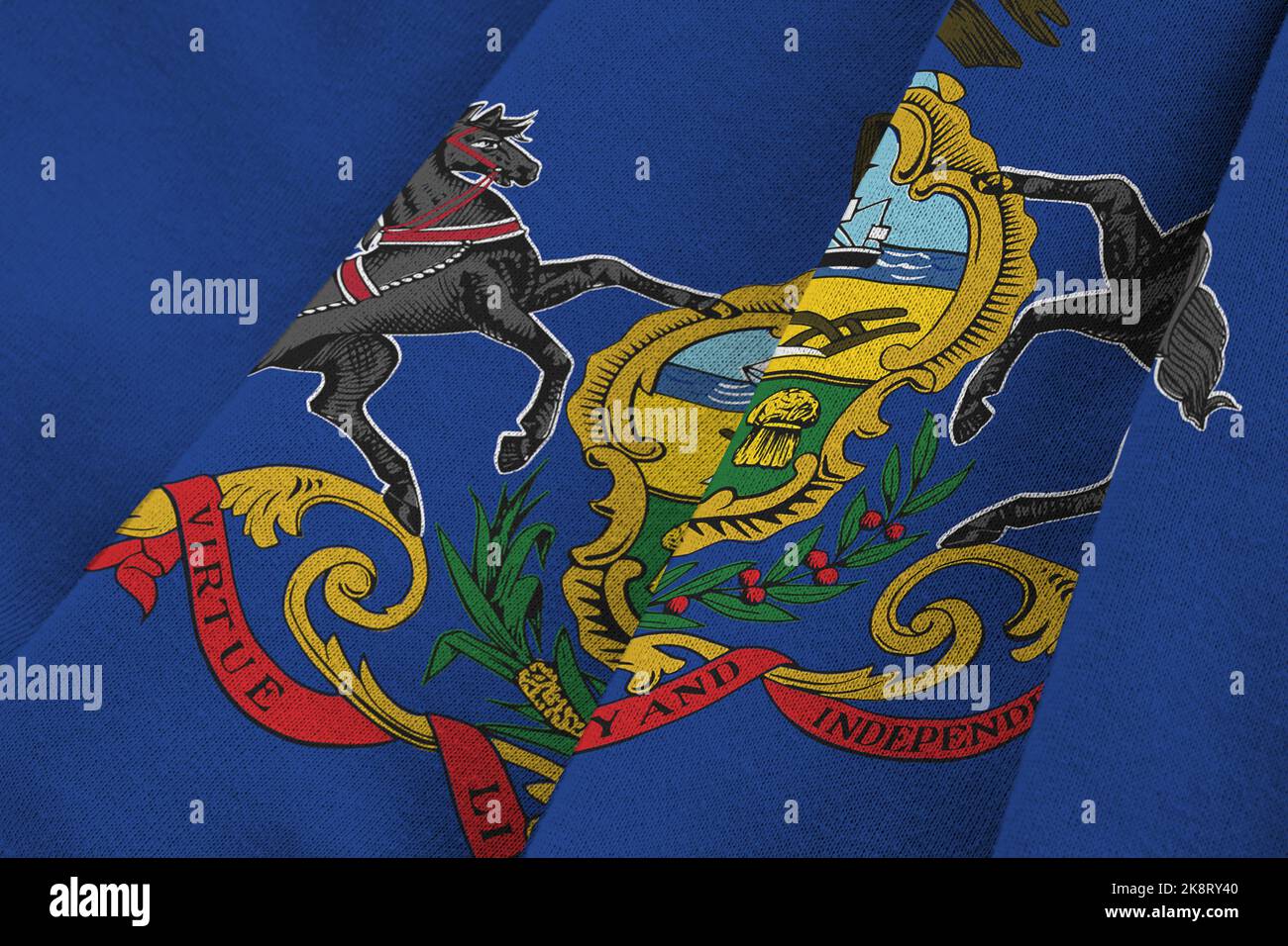 Pennsylvania US state flag with big folds waving close up under the