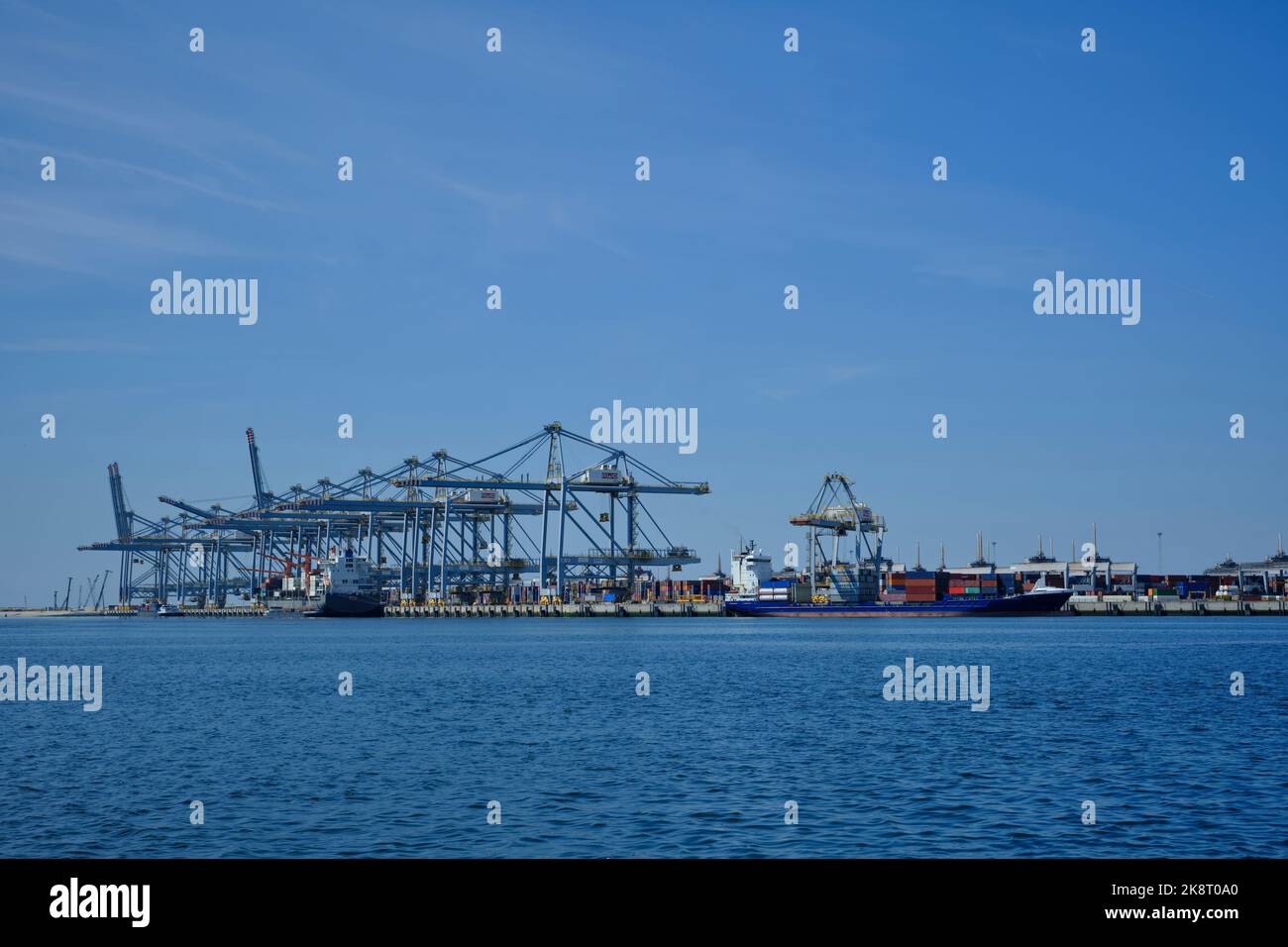 Land Container Terminal Image Rotterdam, The Netherlands. View of a large containership docked in the ...