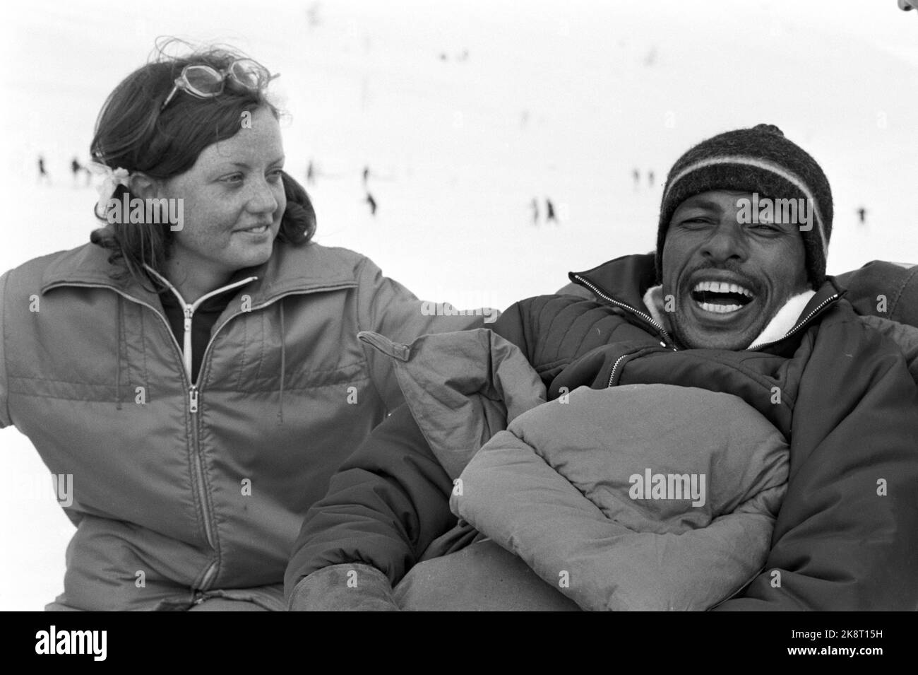 Beitostølen 1971 Abebe Bikila from Ethiopia, twice Olympic champion in the marathon, visits Beitostølen after an invitation from Erling Stordahl. He became paralyzed after a car accident three years ago. He won his class in wooden teams in dog sledding. Here he is with the interpreter, Gunilla Forsmark. Photo: Ivar Aaserud / Current / NTB  newly Stock Photo