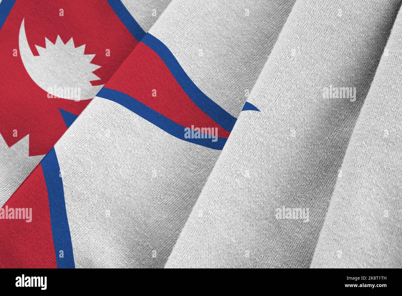 Nepal Flag With Big Folds Waving Close Up Under The Studio Light 
