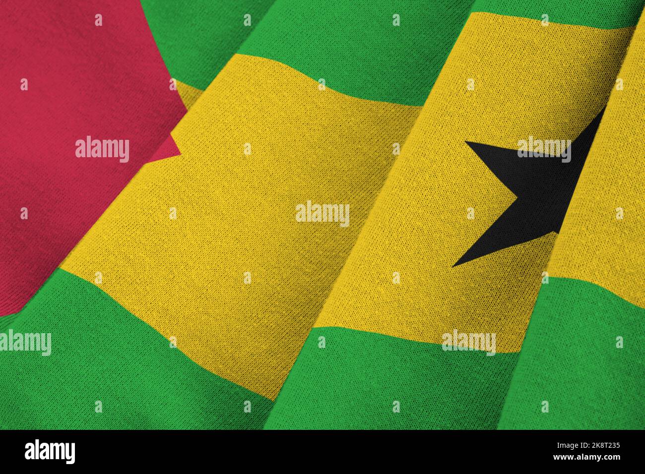 sao-tome-and-principe-flag-with-big-folds-waving-close-up-under-the