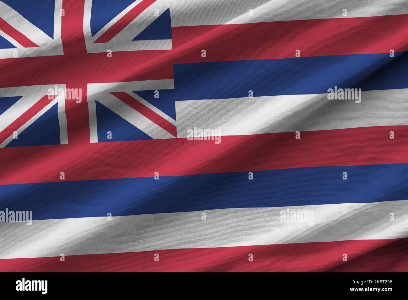 Hawaii US state flag with big folds waving close up under the studio