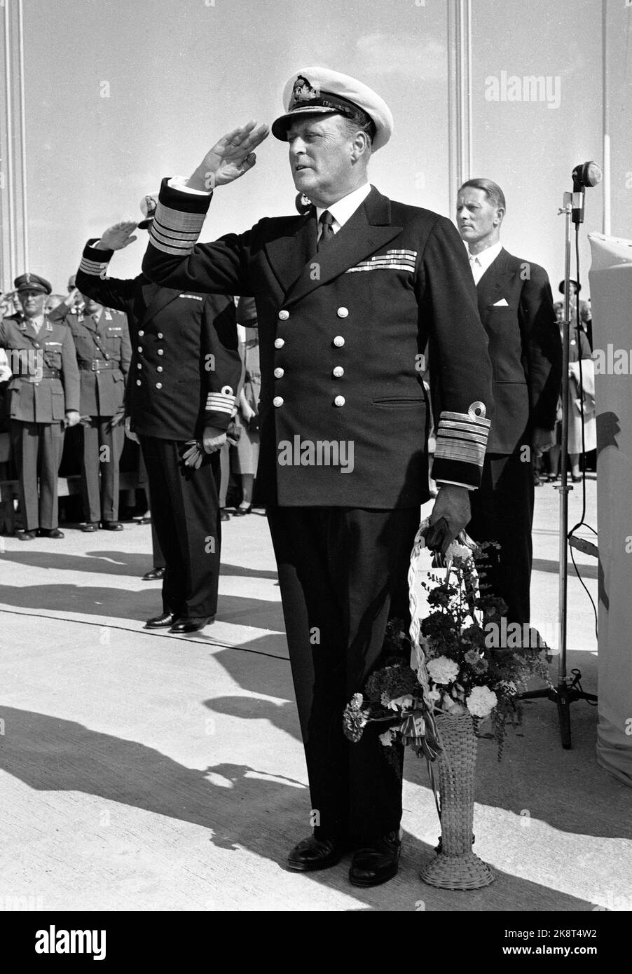 Fredrikstad 19570718 Crown Prince Olav opens the Fredrikstad Bridge,- bridge over Glomma between Østre and Vestre Fredrikstad. The Crown Prince in Uniform, is honored. Photo: Jan Nordby / NTB / NTB Stock Photo