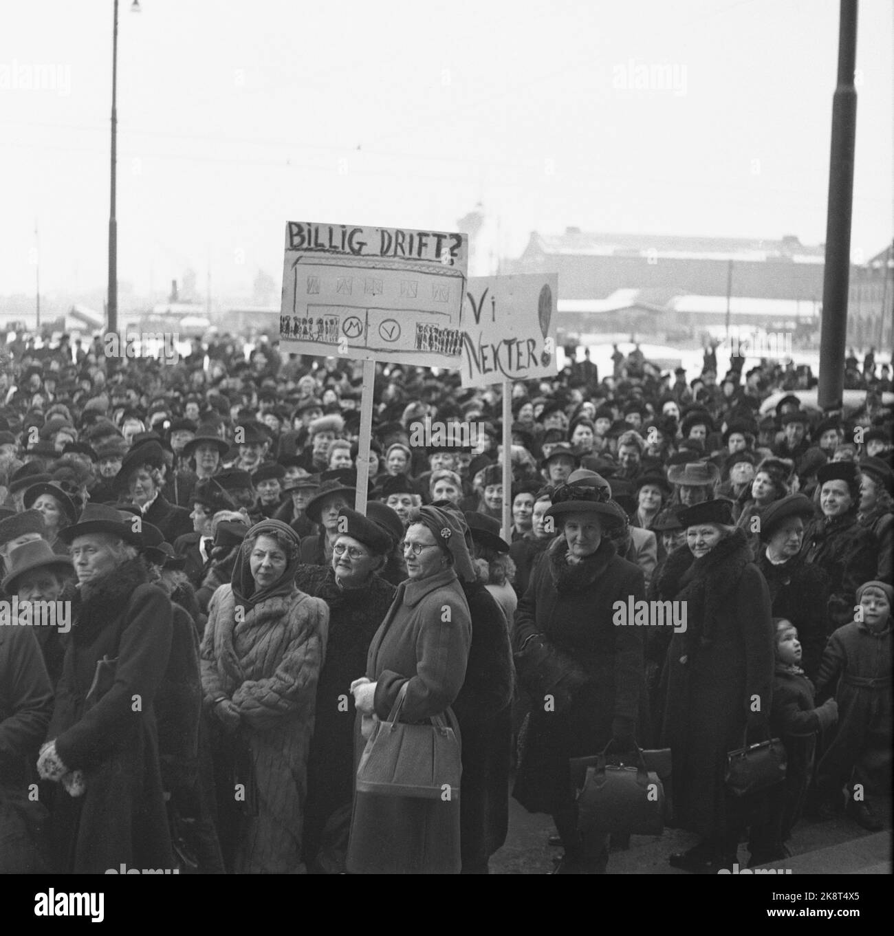 Ntb coats hats fur demonstrations women mothers crowd posters hires