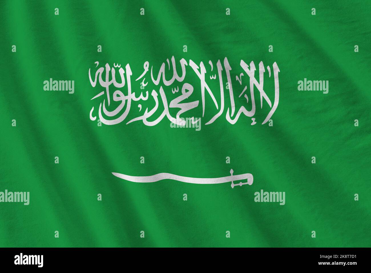 Saudi Arabia Flag With Big Folds Waving Close Up Under The Studio Light 