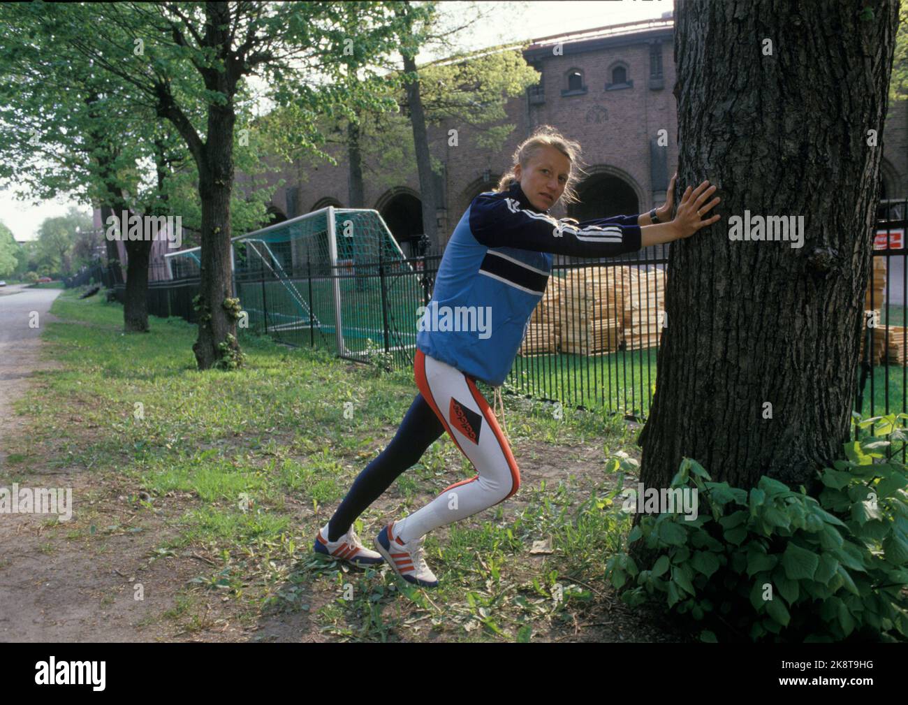 Stockholm, Sweden 19870513 Athletics Conference. Grete Waitz stretches out after a workout .. Photo: Per Løchen Stock Photo