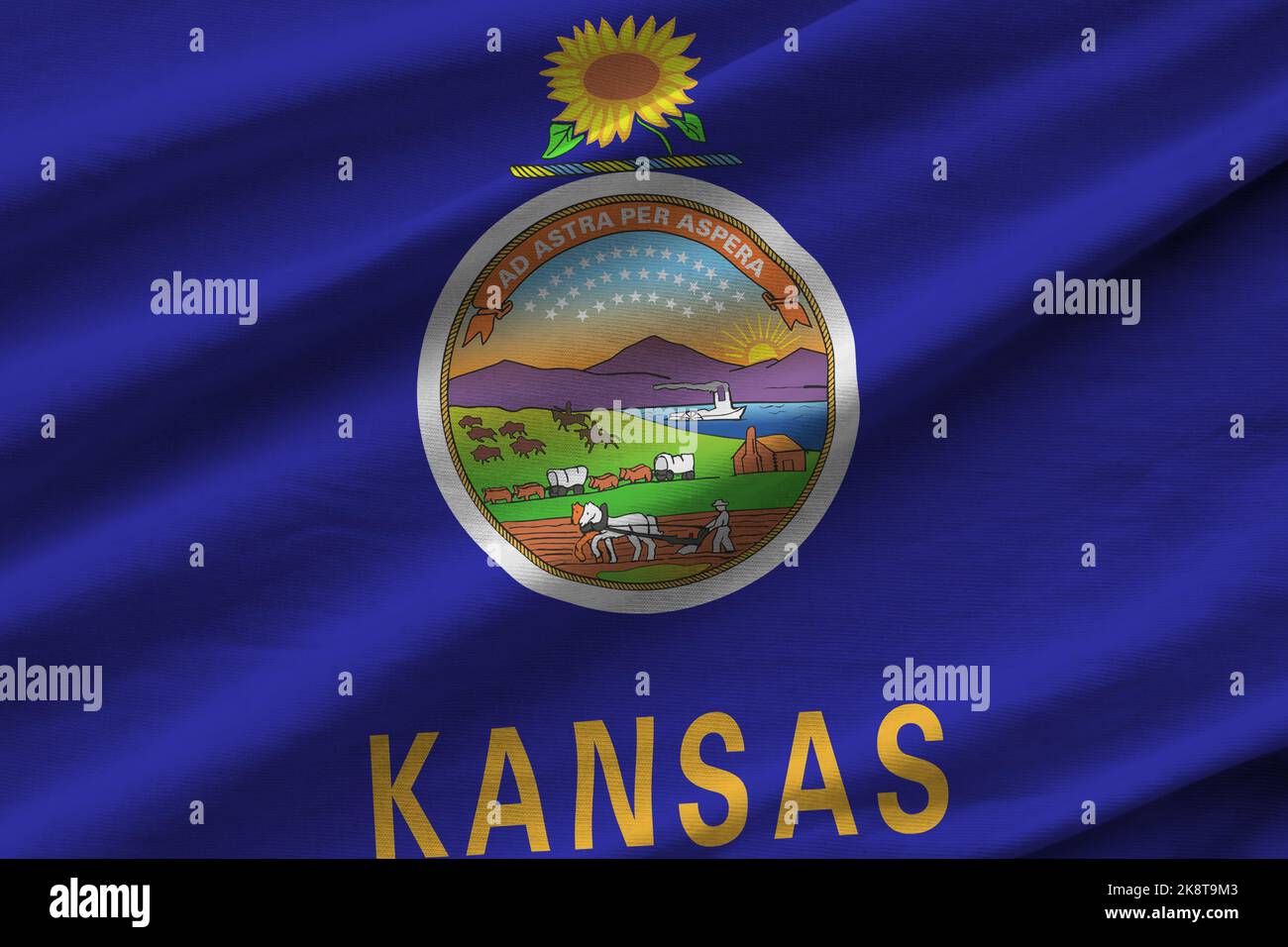 Kansas US state flag with big folds waving close up under the studio