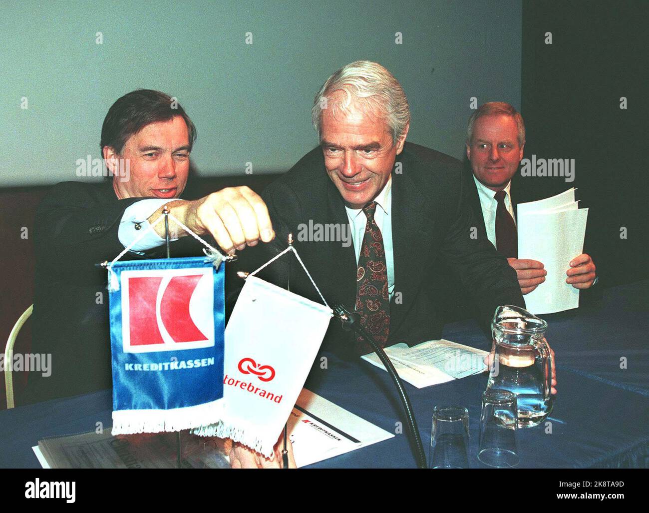 Oslo 19970402 Storebrand and Kreditkassen announced at a press conference that they would merge into one company named Christiania. Borger A. Lenth is here flanked by Åge Korsvold (TV) and Tom Ruud. Photo: Bjørn Sigurdsøn / NTB / NTB Stock Photo