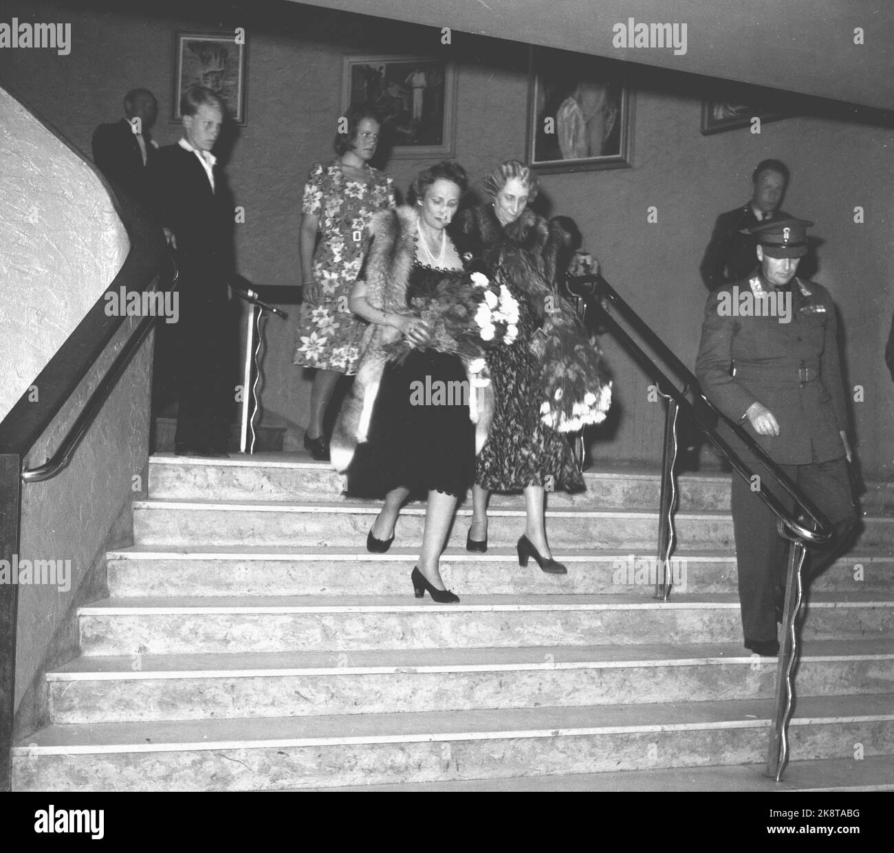 Oslo July 1945. The Crown Prince couple Olav and Märtha, Prince Carl of Sweden and Princess Ingeborg at Chat Noir Theater. The princesses wearing (each) chair. Photo: R.J. / Ntb Stock Photo