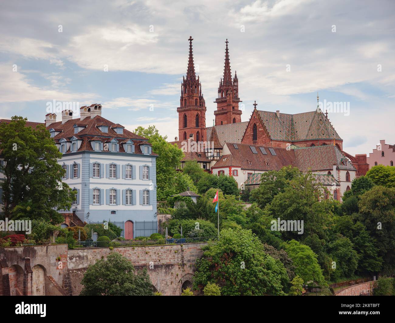 Buildings in the city centre of Basel , Switzerland. Basel Cathedral is ...