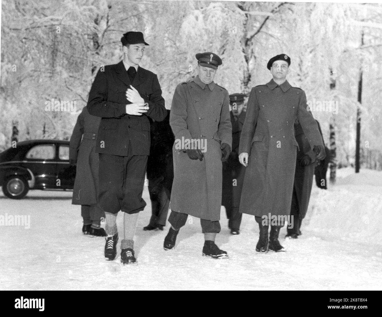 Trandum 19560112 Prince Harald t.v arrives Trandum. Here he is received by Colonel K. Winge and the head of school, Major C. A. Johnsen. Photo: Current / NTB Stock Photo