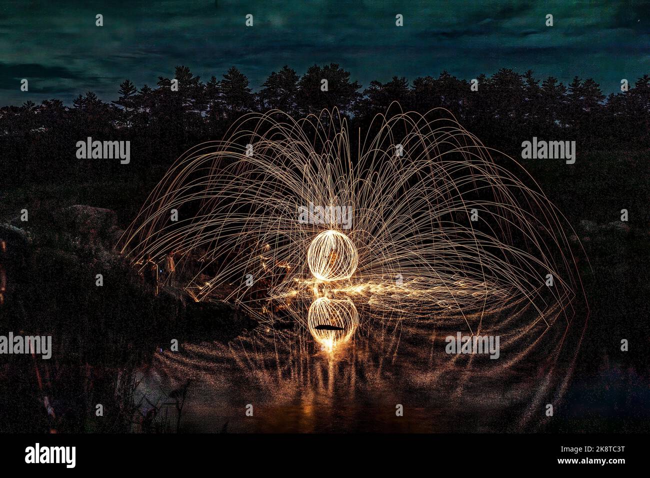 A steel wool painting and reflection on the lake Stock Photo Alamy