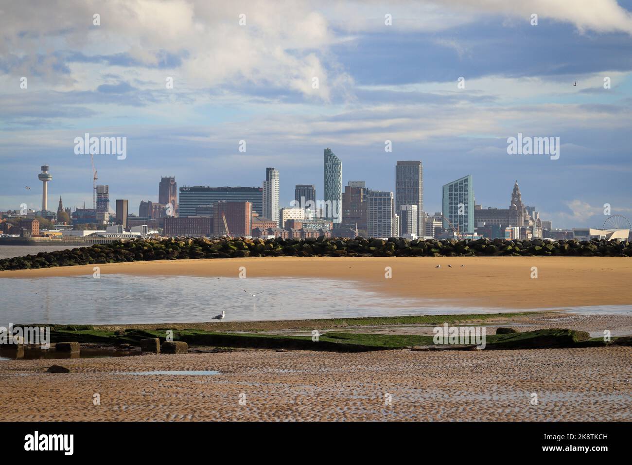 Liverpool City Skyline, as seen from New Brighton, Wirral, including the 3 graces, cathedrals and the Radio City Tower Stock Photo