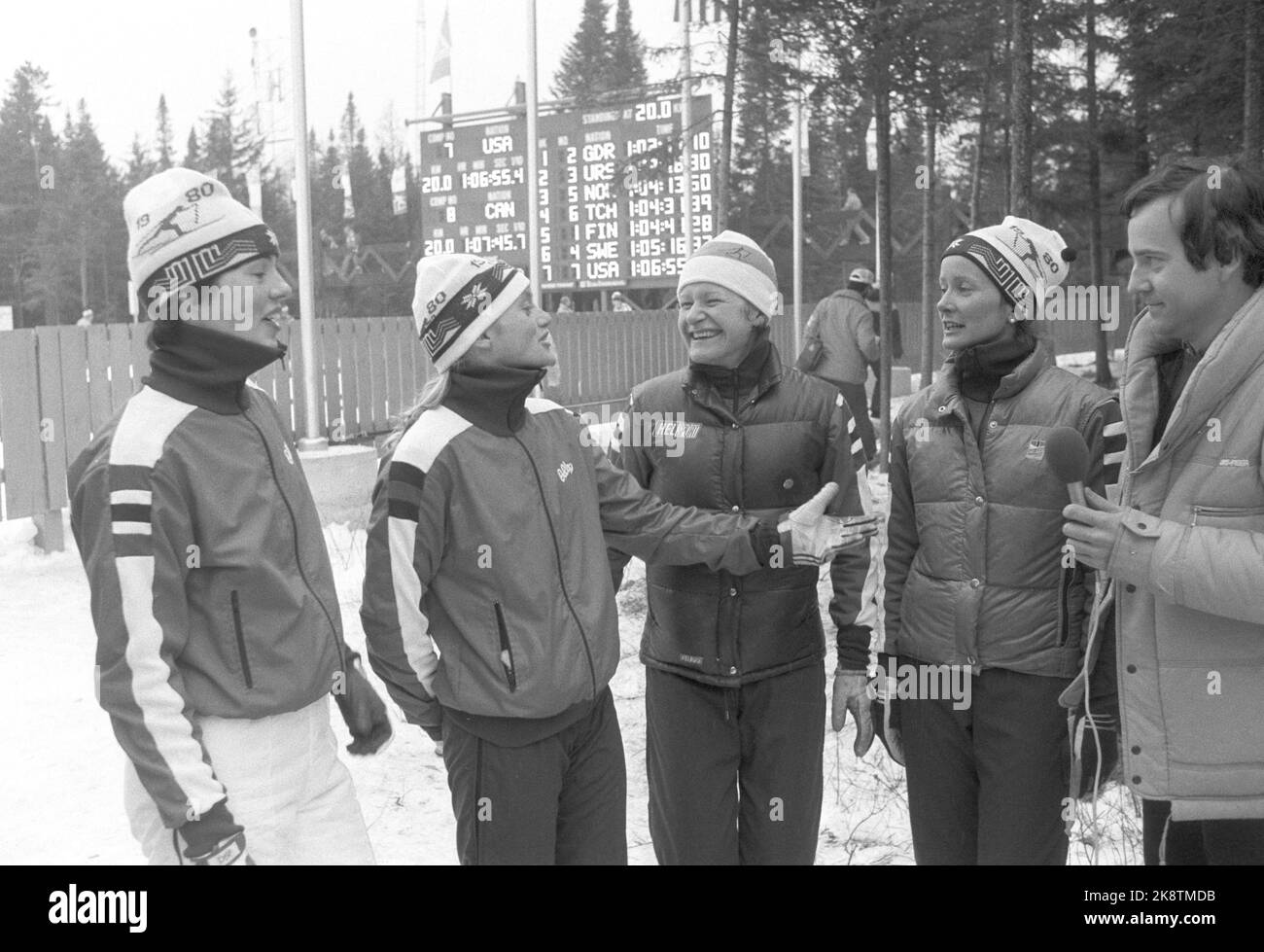 Lake Placid 19800221: Team picture from 4x5 km relay where the girls won bronze medal during the Olympics. From left Brit Pettersen, Anette Bøe, Berit Kvello Aunli and Marit Myrmæl interviewed by reporter Rolf Hovden in NRK. Photo: Erik Thorberg NTB / NTB Stock Photo