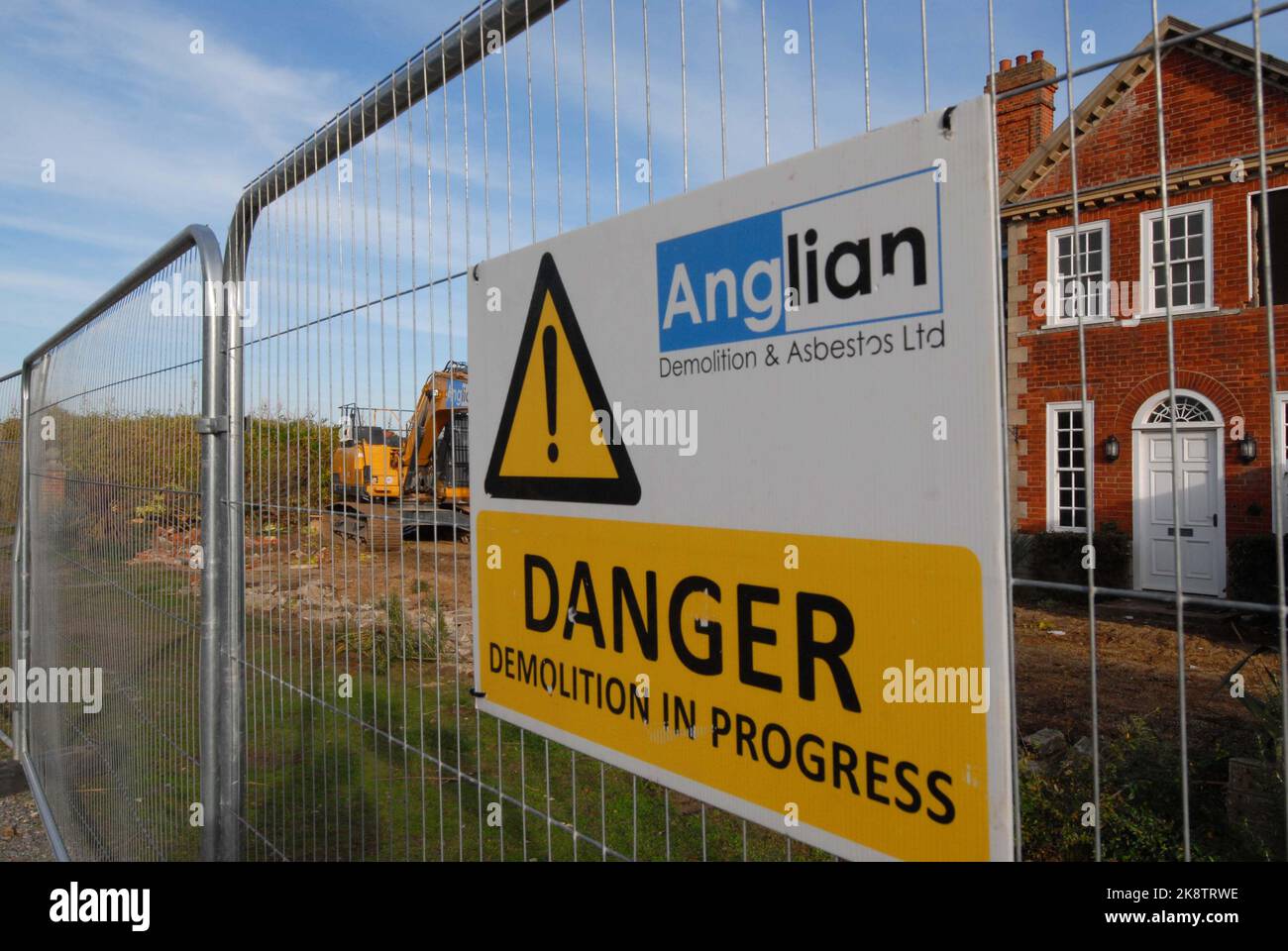Danger Demolition Sign at site of Luxury Red House, viewed as unsafe due to Coastal Erosion. Thorpeness 22 October 2022 Stock Photo