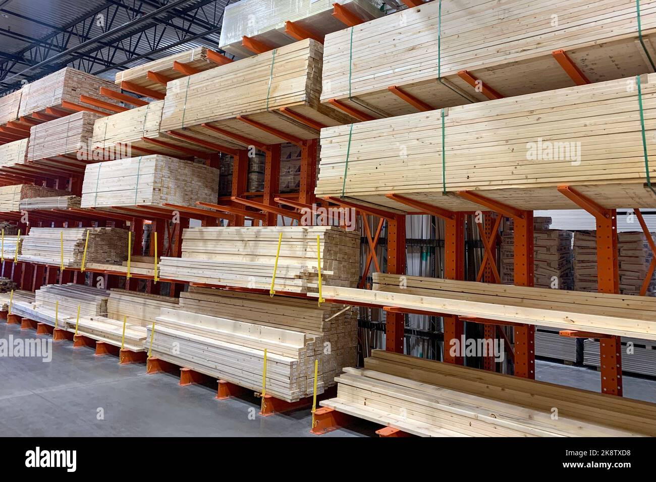 Wood factory stock or timber in warehouse. Piles of wooden boards