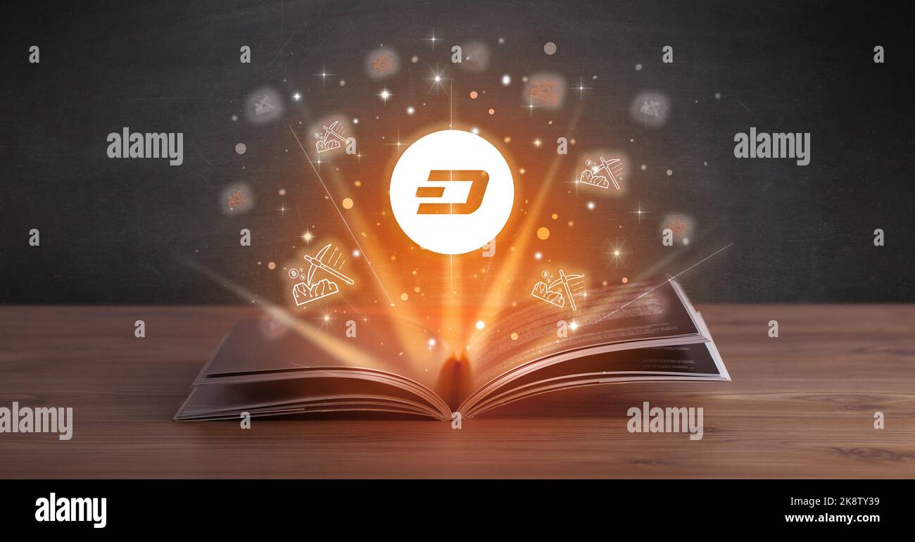Open book with currency icons above Stock Photo - Alamy