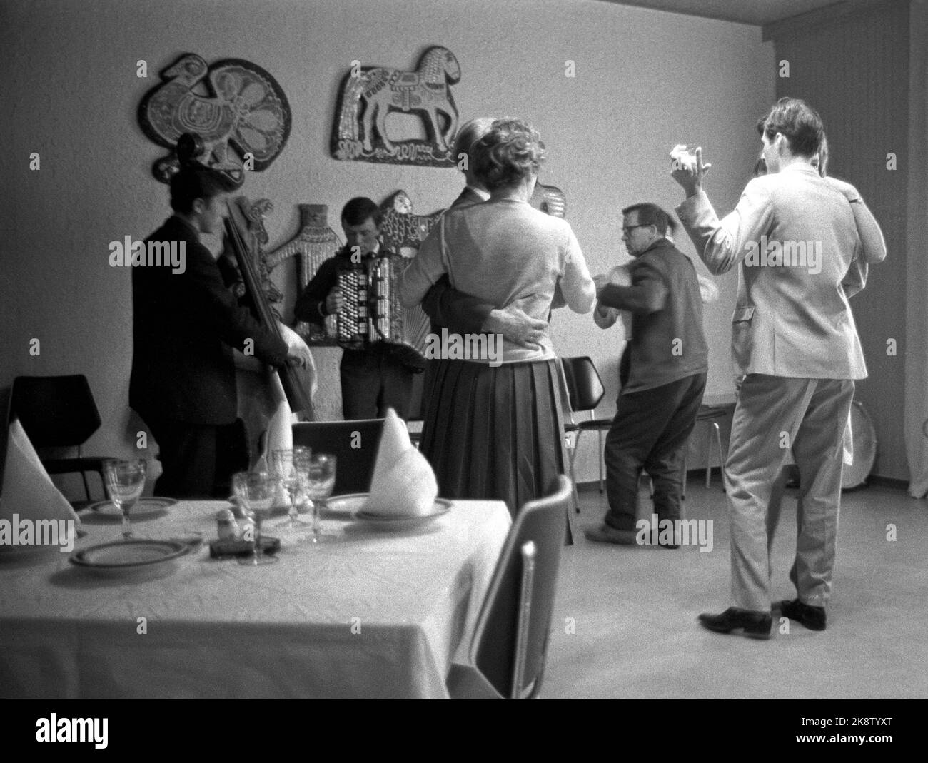 Boris Gleb, Soviet April 1965. 'Russian tourist weapons: Vodka'. Visa -free access to the Soviet Union. Boris Gleb can tempt with an art exhibition, cinema and visits to the power plant, but the foremost lure is Vodka. In the restaurant / bar in Boris Gleb it is possible to get a swing also, but for Norwegians it is the vodka that draws the most. In addition to consumption on site, you can bring a bottle of cheap liquor home. Photo: Sverre A Børretzen / Current / NTB. Stock Photo