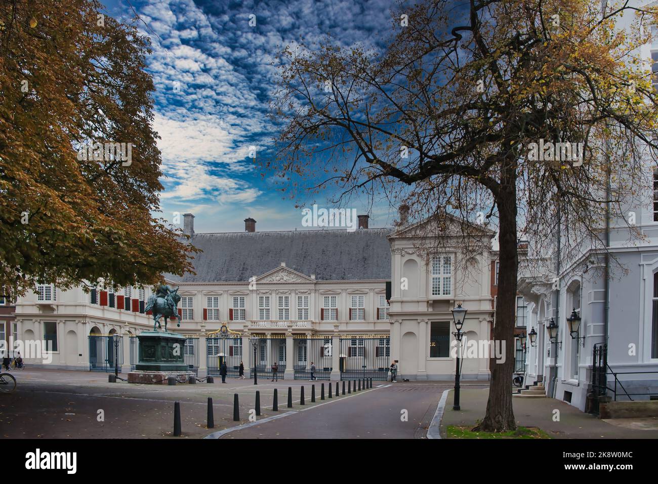 The Royal Palace Noordeinde in The Hague, the Netherlands, build in the Dutch classicism style. In front of the palace a statue of William of Orange. Stock Photo